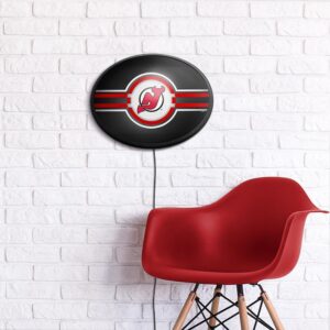 New Jersey Devils: Officially Licensed NHL Oval Slimline Illuminated Wall Sign 14" x 18" by Fathead